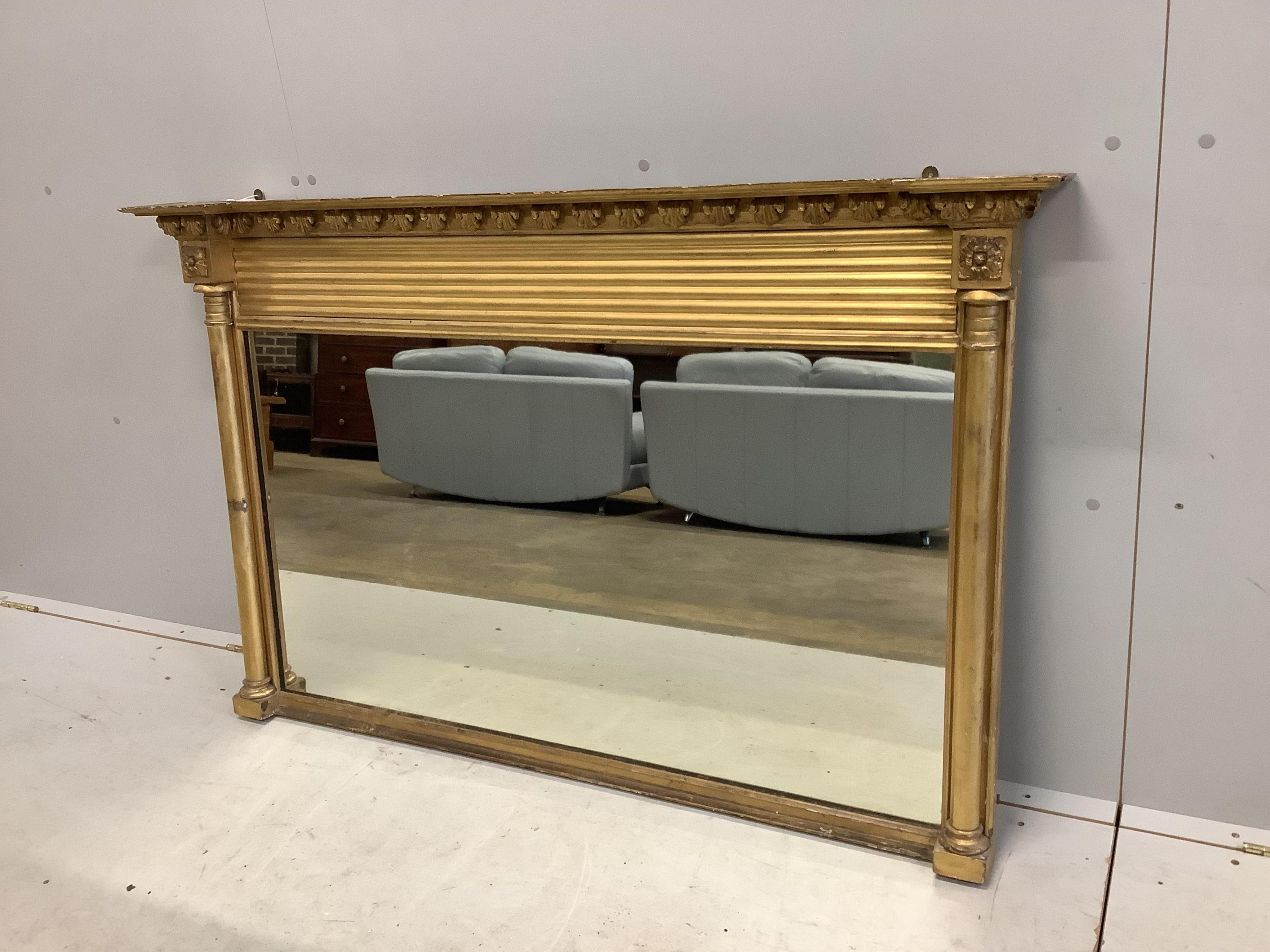 A Regency giltwood and composition overmantel mirror, width 139cm, height 87cm. Condition - fair to good